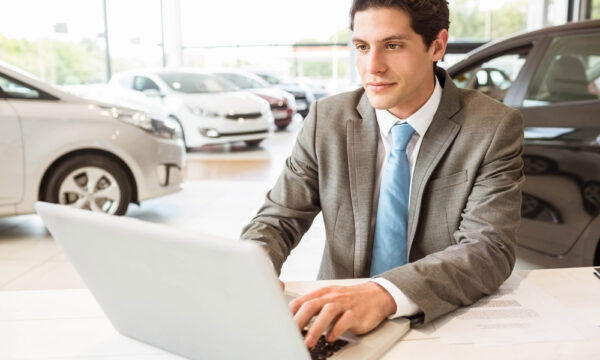 Man using HomeNet IOL Features on a Laptop